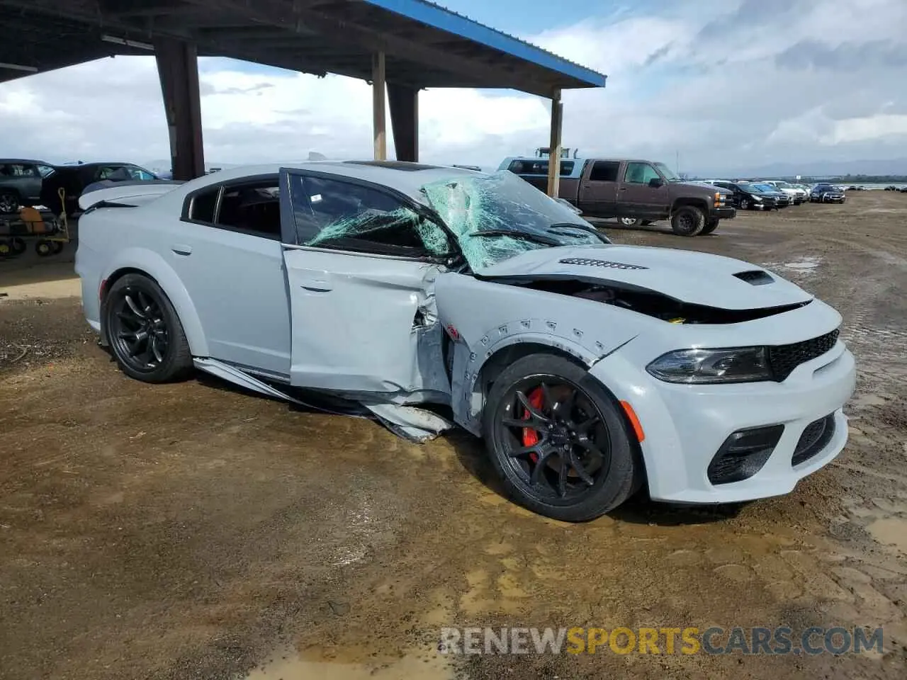 4 Photograph of a damaged car 2C3CDXL9XNH107939 DODGE CHARGER 2022