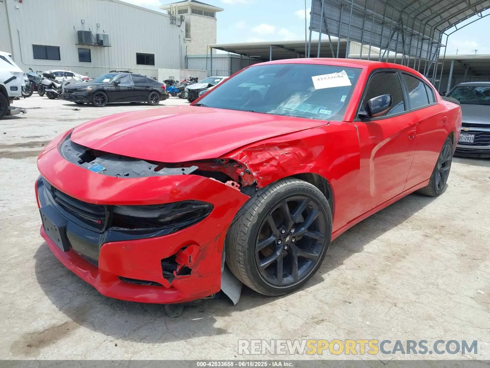 2 Photograph of a damaged car 2C3CDXBG1PH598467 DODGE CHARGER 2023
