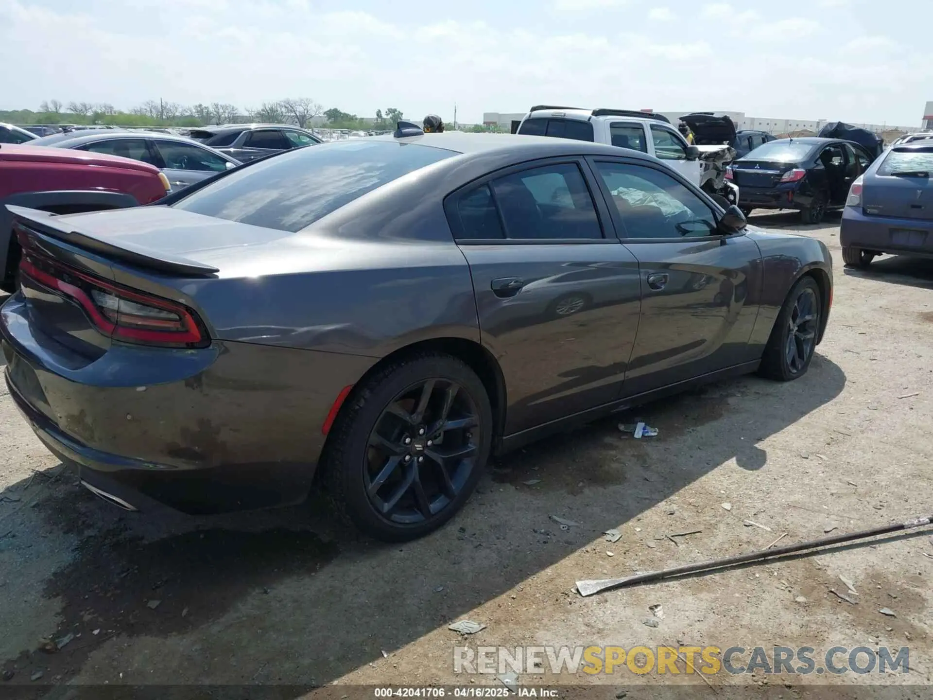 4 Photograph of a damaged car 2C3CDXBG2PH523647 DODGE CHARGER 2023