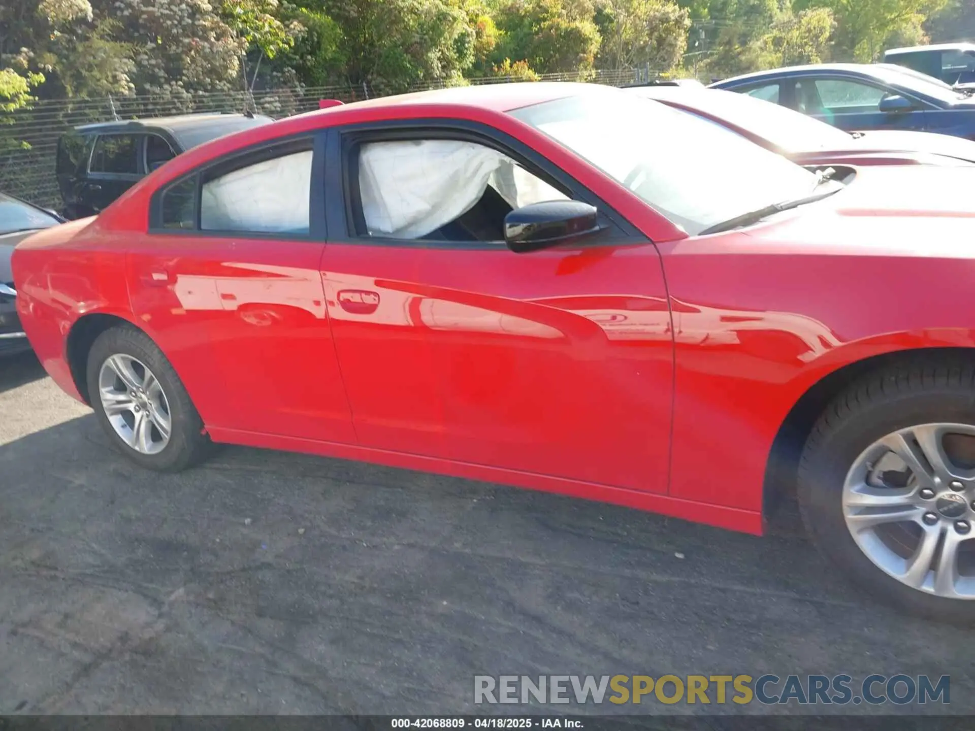 12 Photograph of a damaged car 2C3CDXBG3PH702702 DODGE CHARGER 2023