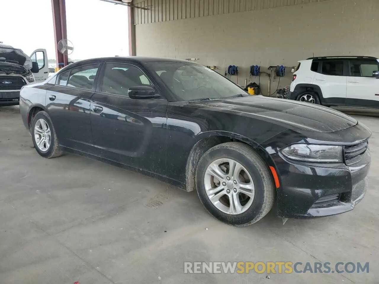 4 Photograph of a damaged car 2C3CDXBG6PH533386 DODGE CHARGER 2023