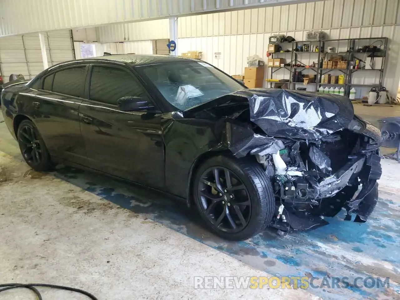 4 Photograph of a damaged car 2C3CDXBG7PH534675 DODGE CHARGER 2023