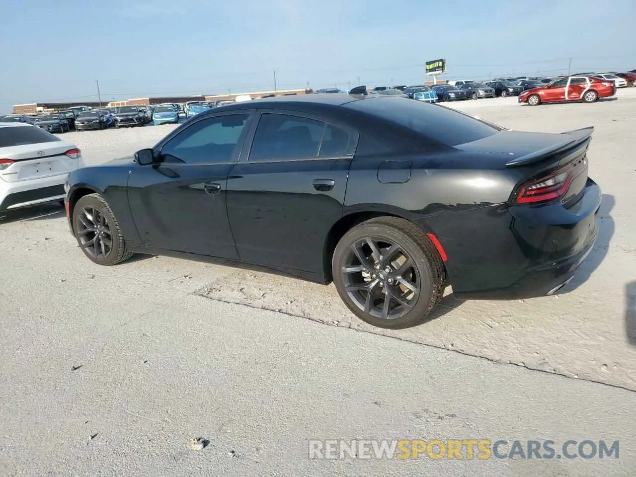 2 Photograph of a damaged car 2C3CDXBG8PH599096 DODGE CHARGER 2023