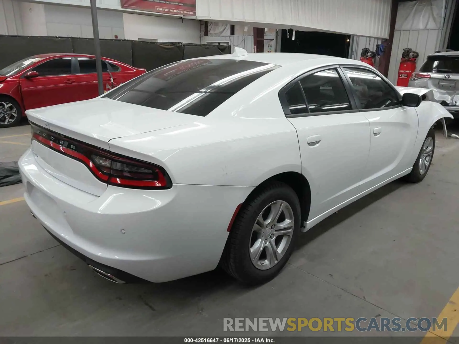 4 Photograph of a damaged car 2C3CDXBG8PH656431 DODGE CHARGER 2023