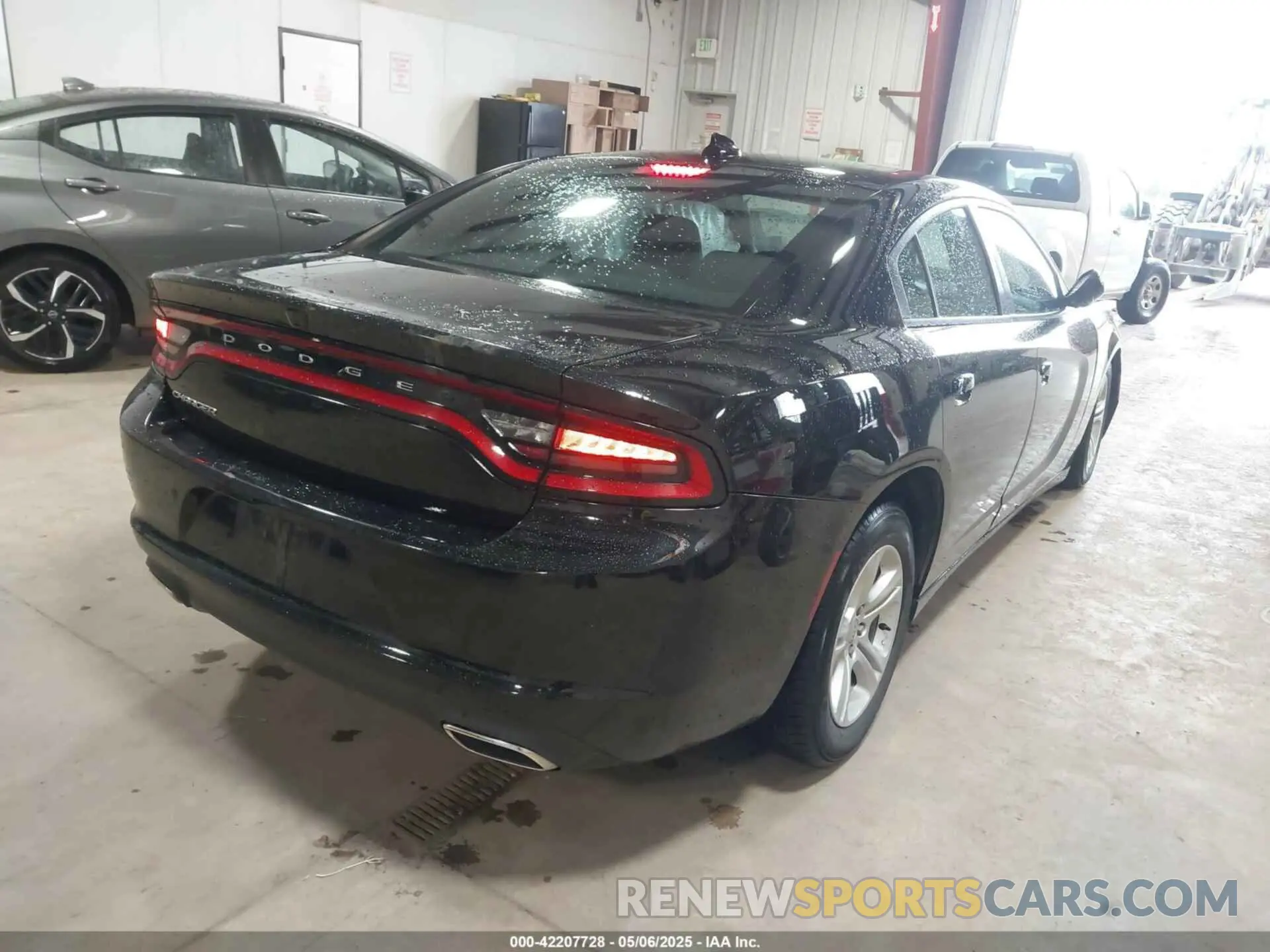 4 Photograph of a damaged car 2C3CDXBGXPH515585 DODGE CHARGER 2023