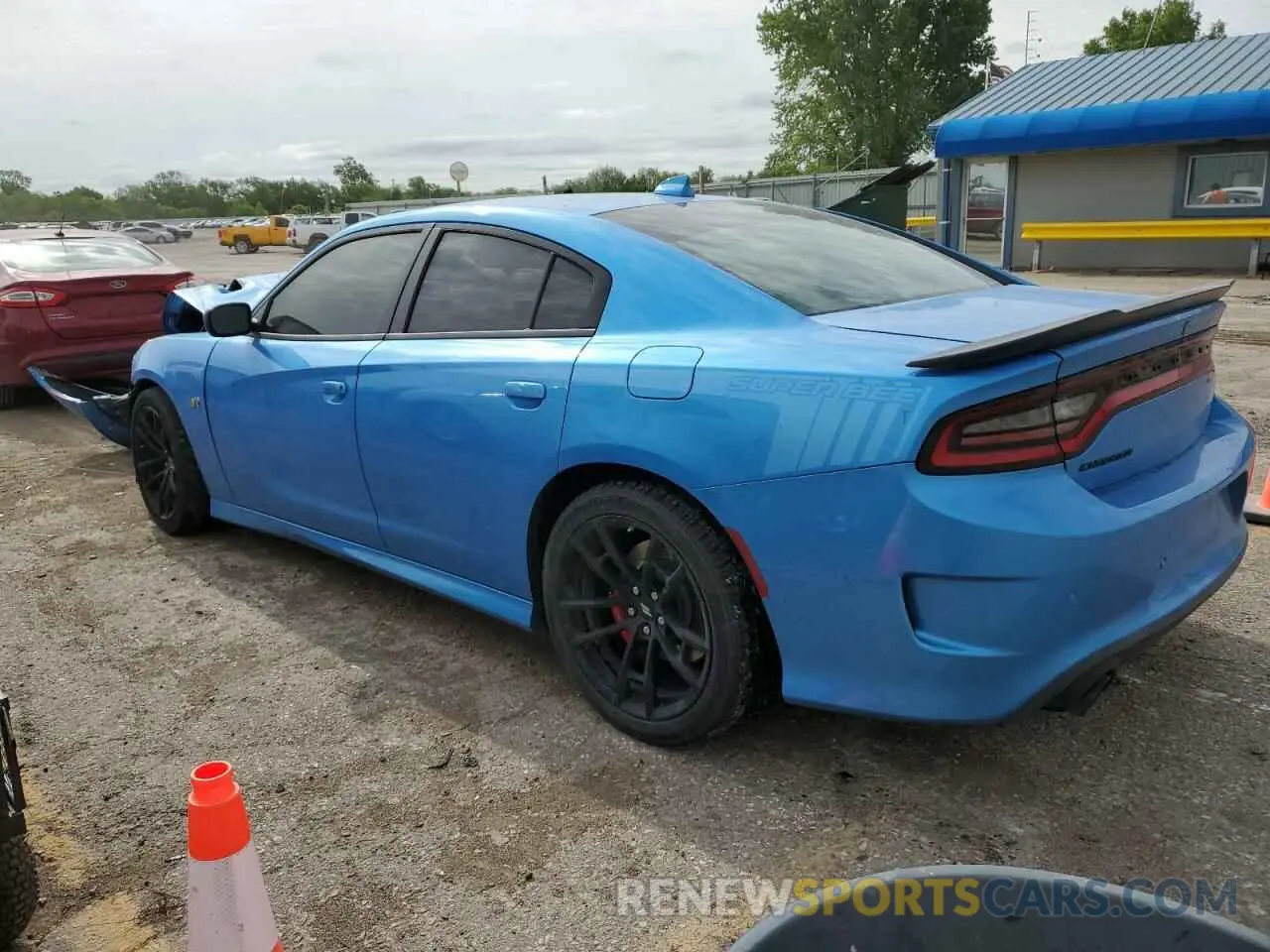2 Photograph of a damaged car 2C3CDXGJ0PH568557 DODGE CHARGER 2023