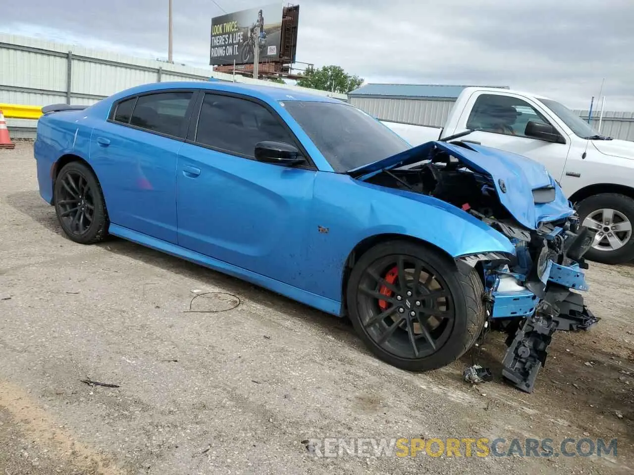 4 Photograph of a damaged car 2C3CDXGJ0PH568557 DODGE CHARGER 2023