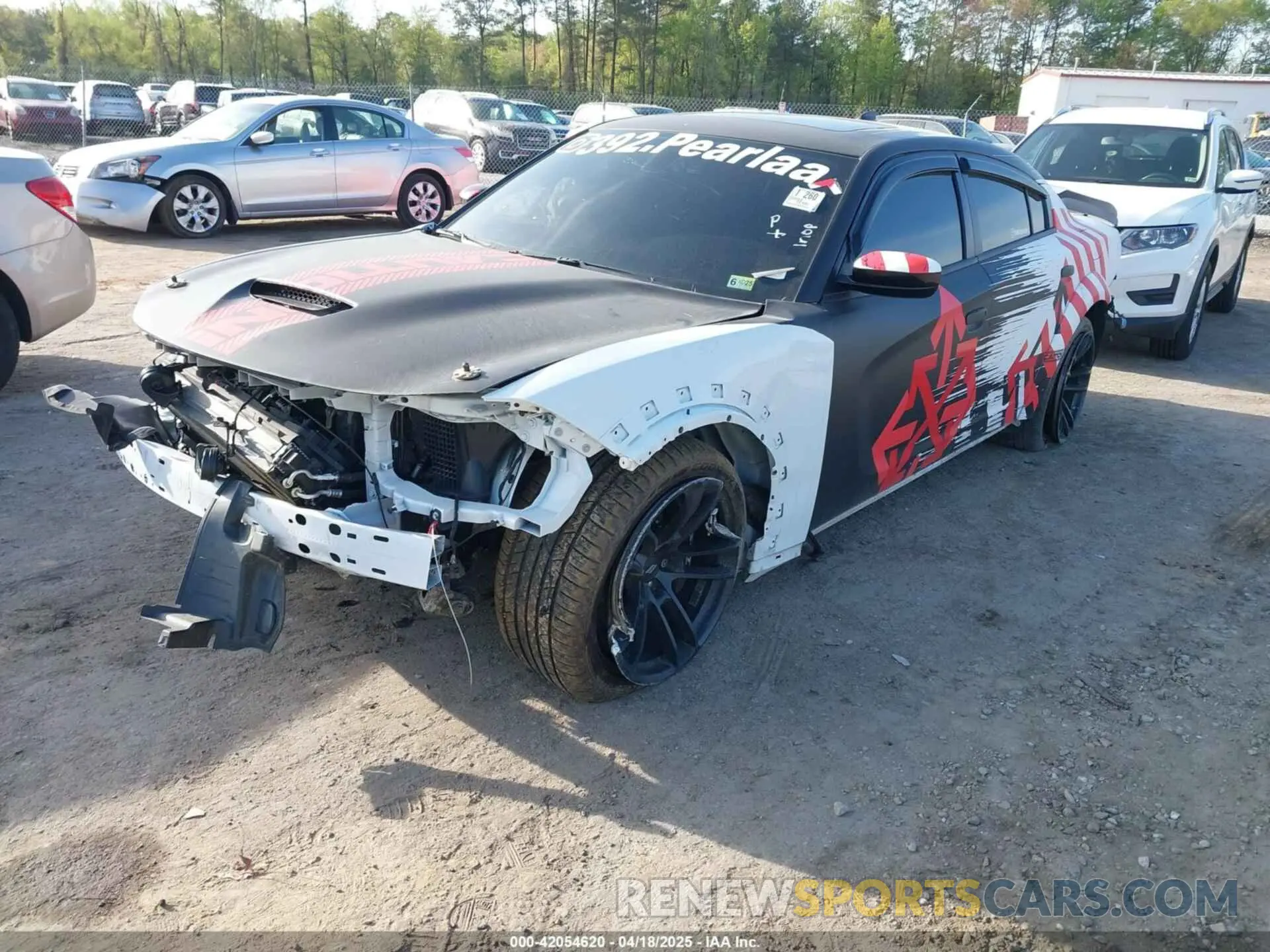 2 Photograph of a damaged car 2C3CDXGJ3PH628752 DODGE CHARGER 2023