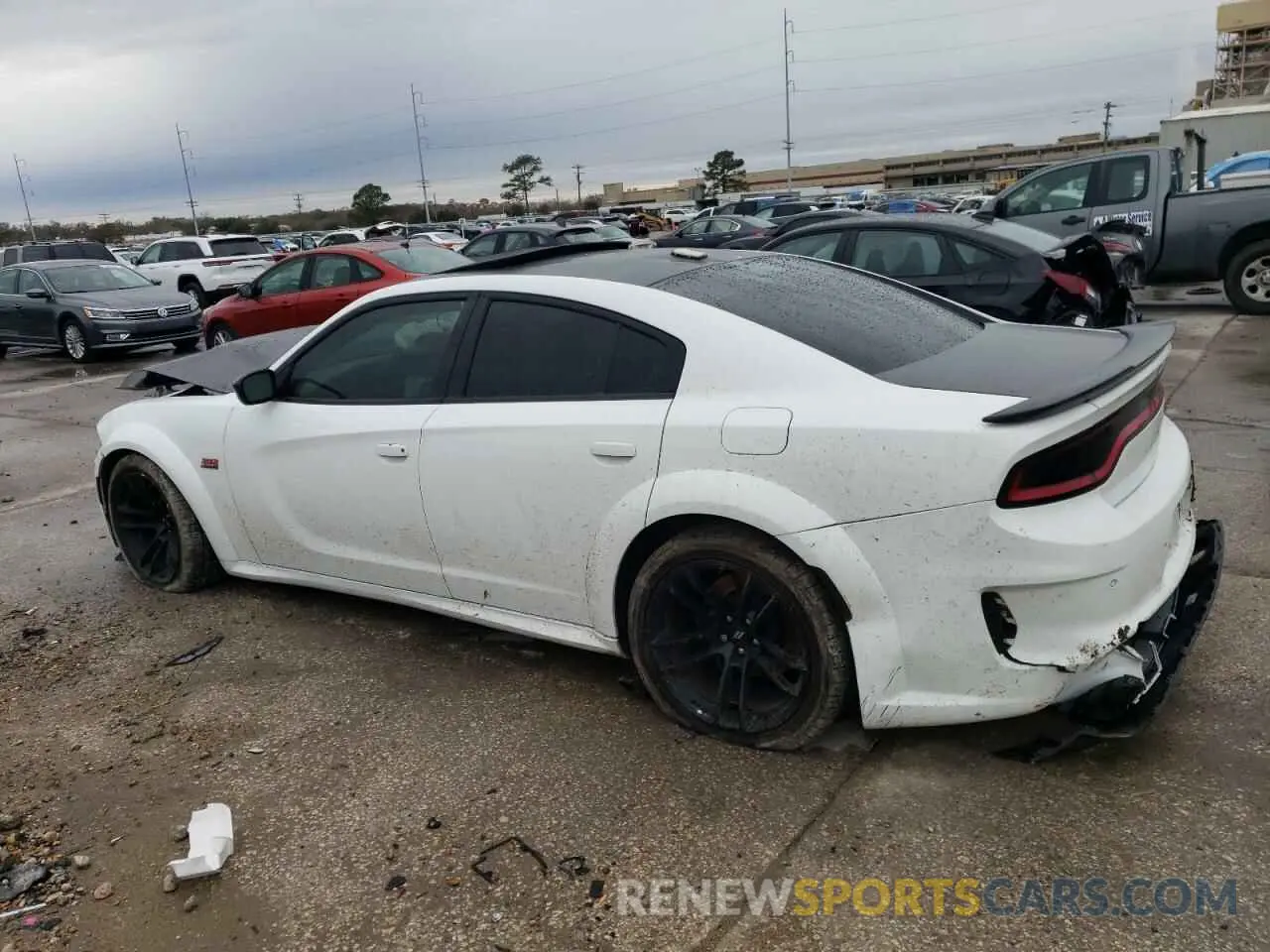 2 Photograph of a damaged car 2C3CDXGJ4PH547923 DODGE CHARGER 2023