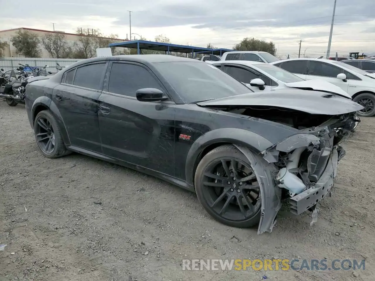 4 Photograph of a damaged car 2C3CDXGJ4PH560543 DODGE CHARGER 2023