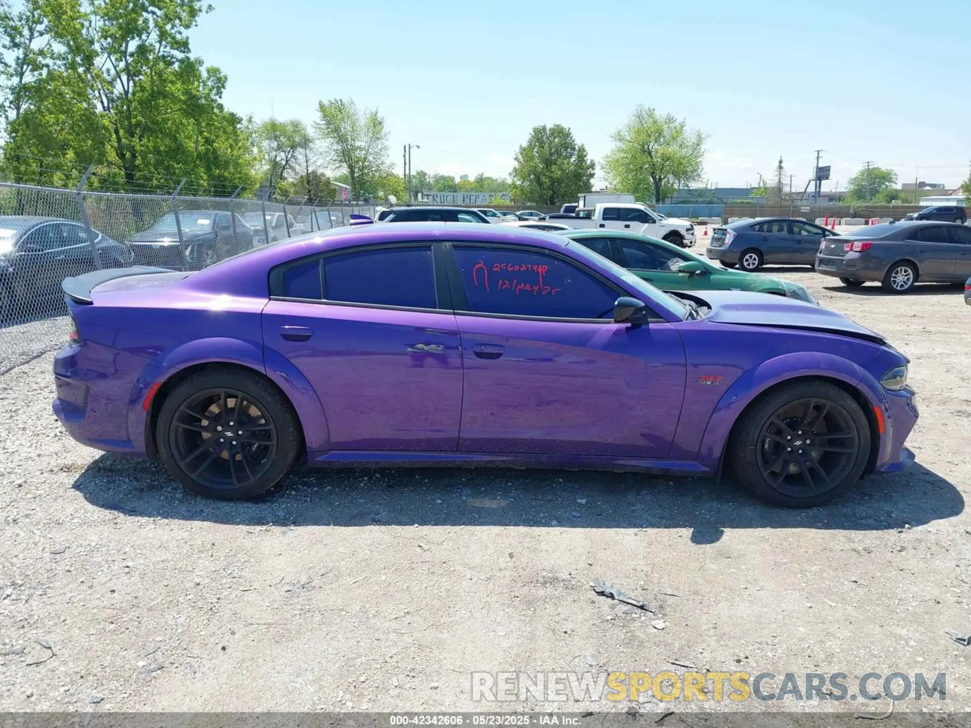 12 Photograph of a damaged car 2C3CDXGJ5PH672610 DODGE CHARGER 2023