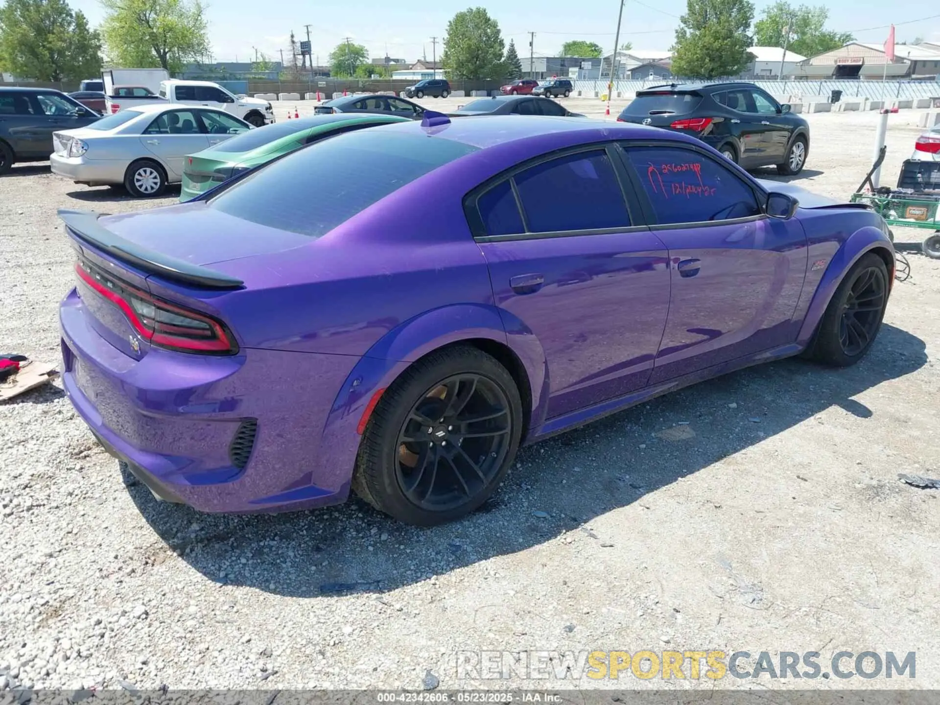 4 Photograph of a damaged car 2C3CDXGJ5PH672610 DODGE CHARGER 2023