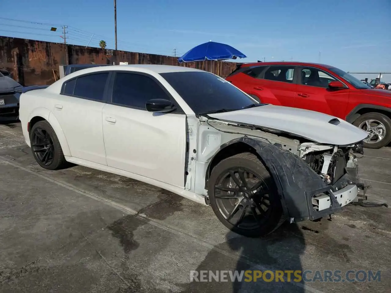 4 Photograph of a damaged car 2C3CDXGJ6PH506371 DODGE CHARGER 2023