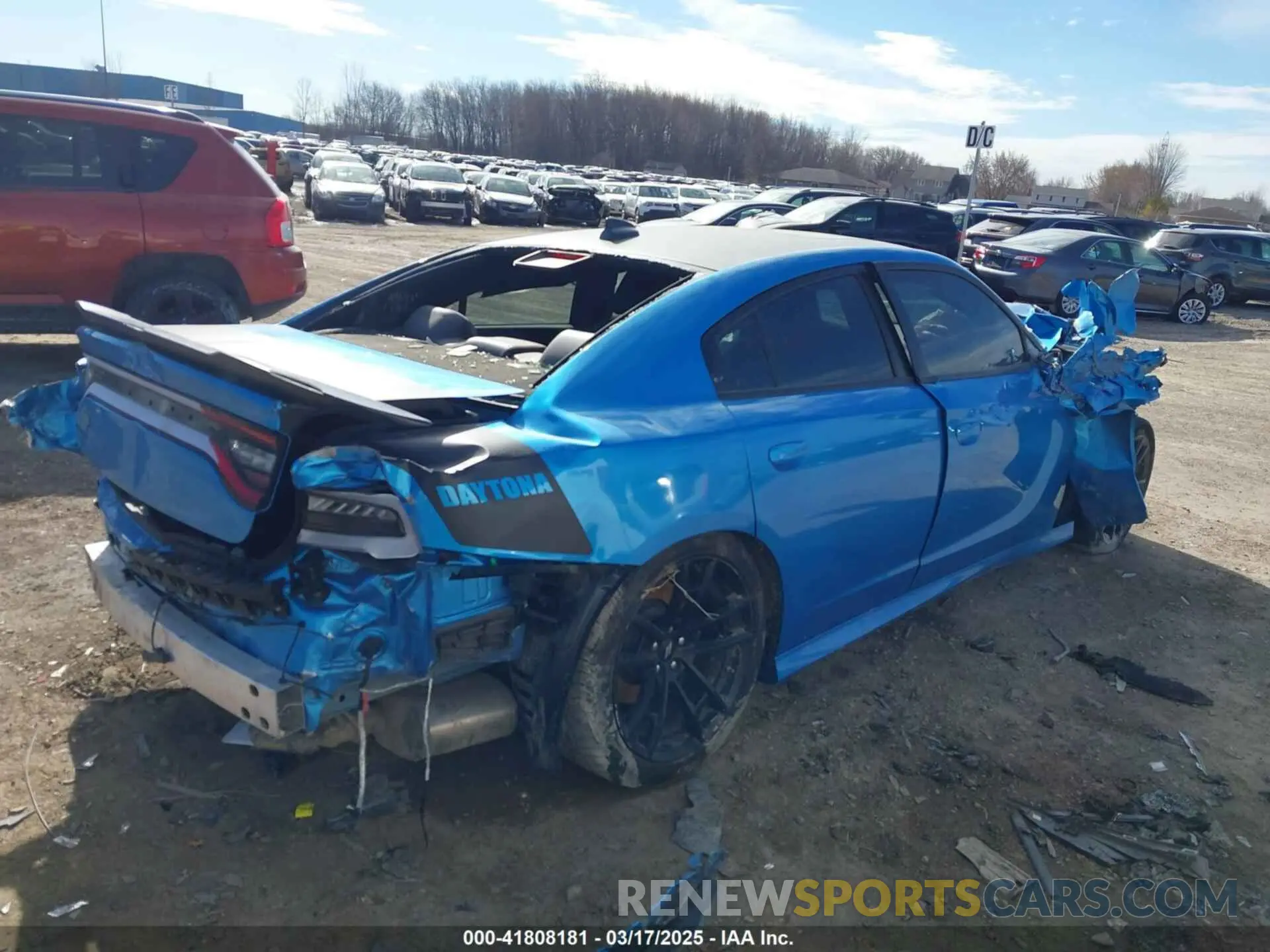 4 Photograph of a damaged car 2C3CDXGJXPH560188 DODGE CHARGER 2023