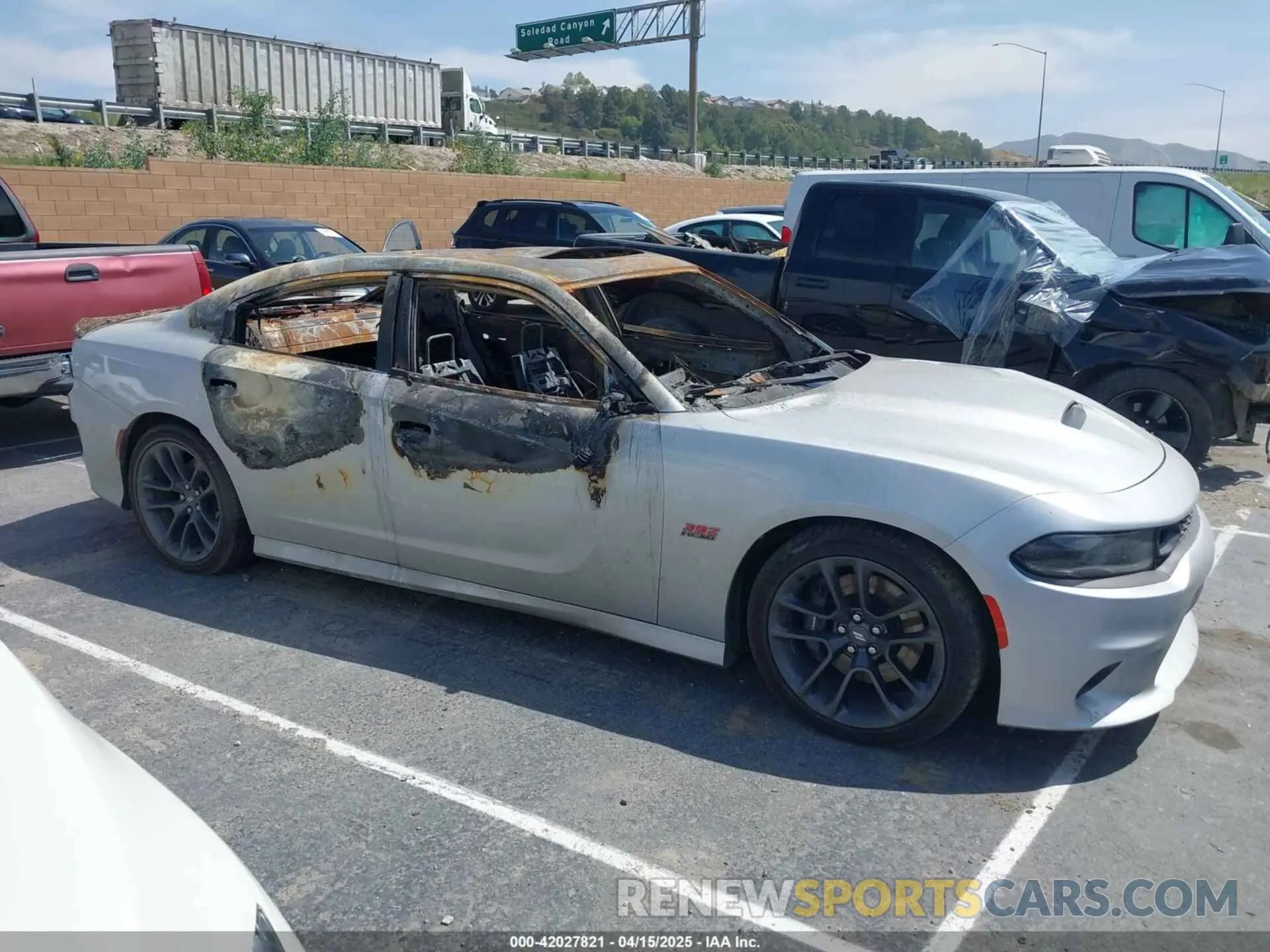 12 Photograph of a damaged car 2C3CDXGJXPH613472 DODGE CHARGER 2023