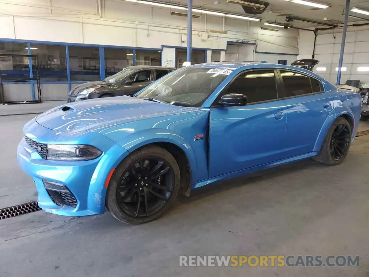 1 Photograph of a damaged car 2C3CDXGJXPH653745 DODGE CHARGER 2023