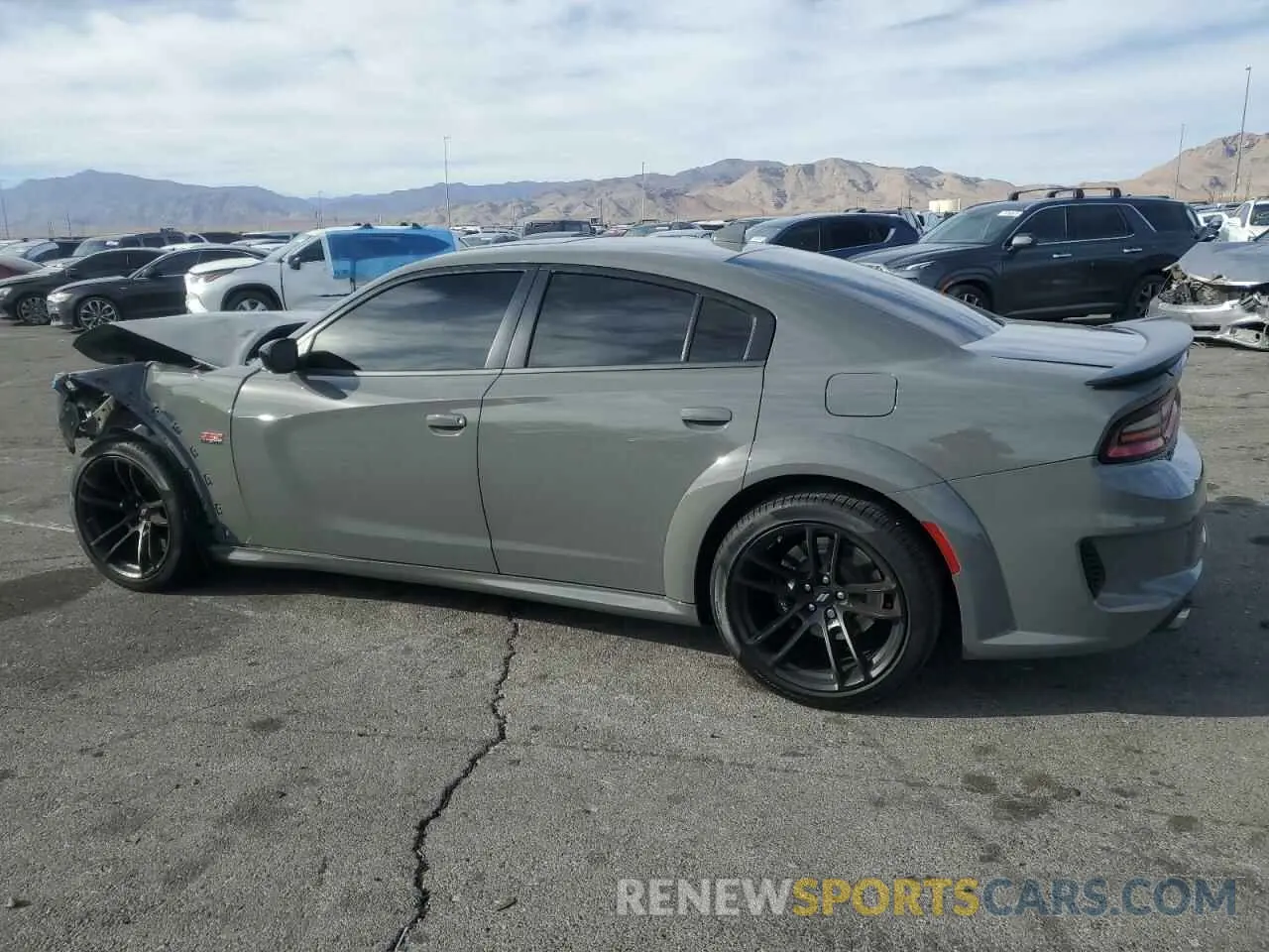 2 Photograph of a damaged car 2C3CDXGJXPH663532 DODGE CHARGER 2023