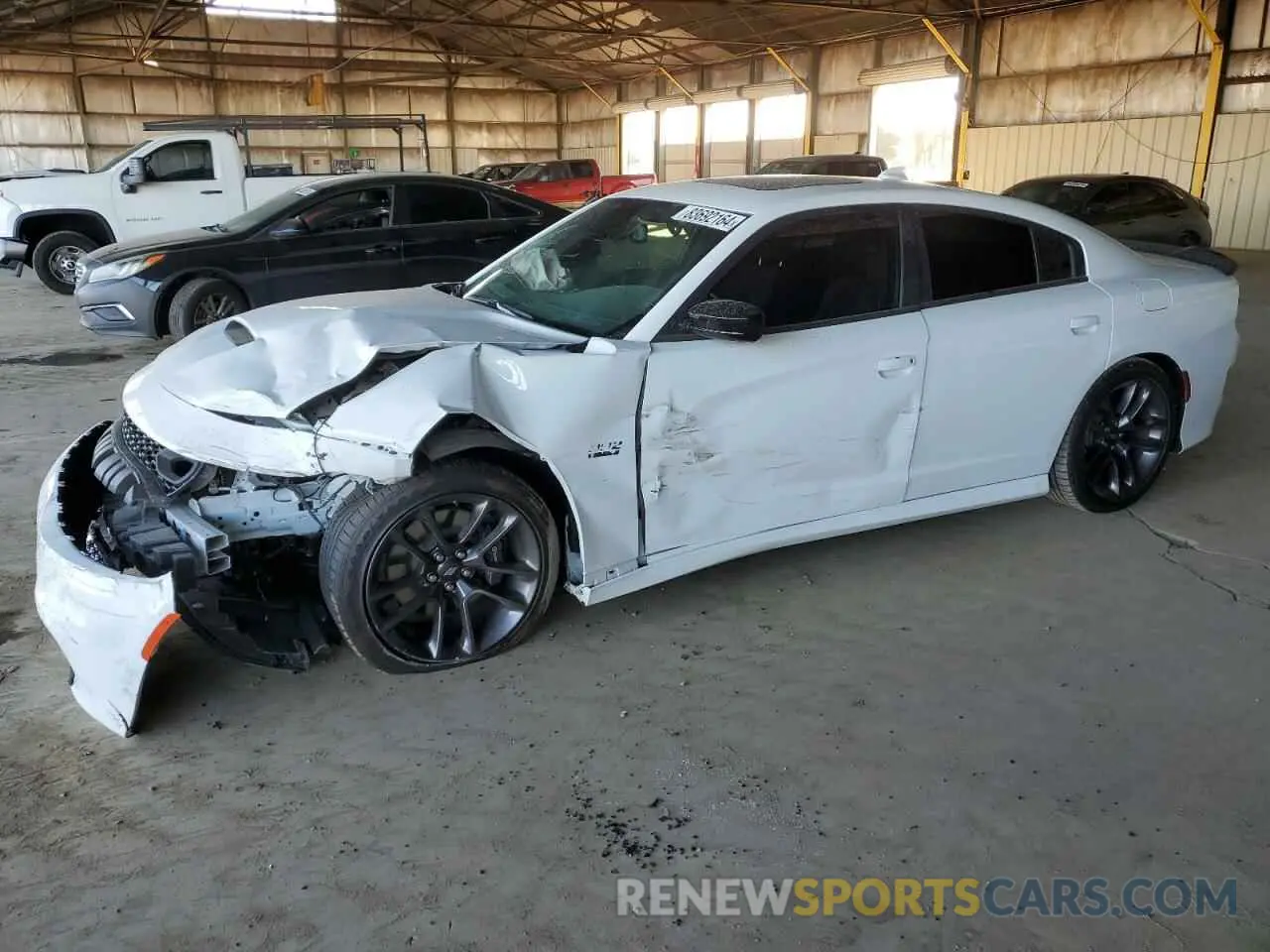 1 Photograph of a damaged car 2C3CDXGJXPH703057 DODGE CHARGER 2023