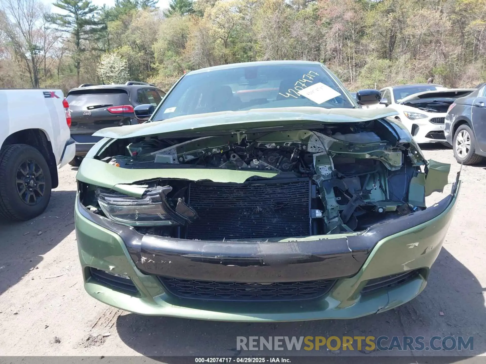 12 Photograph of a damaged car 2C3CDXJGXPH675970 DODGE CHARGER 2023
