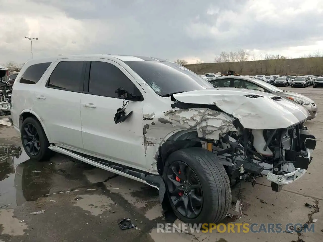 4 Photograph of a damaged car 1C4SDJGJ9NC214380 DODGE DURANGO 2022