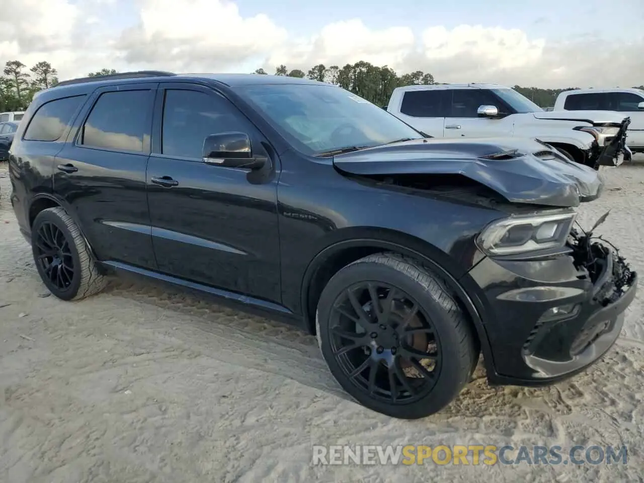 4 Photograph of a damaged car 1C4SDJCT5PC695772 DODGE DURANGO 2023
