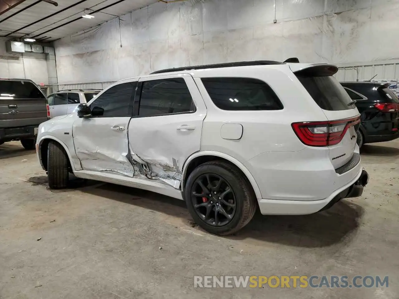 2 Photograph of a damaged car 1C4SDJGJ9PC627774 DODGE DURANGO 2023