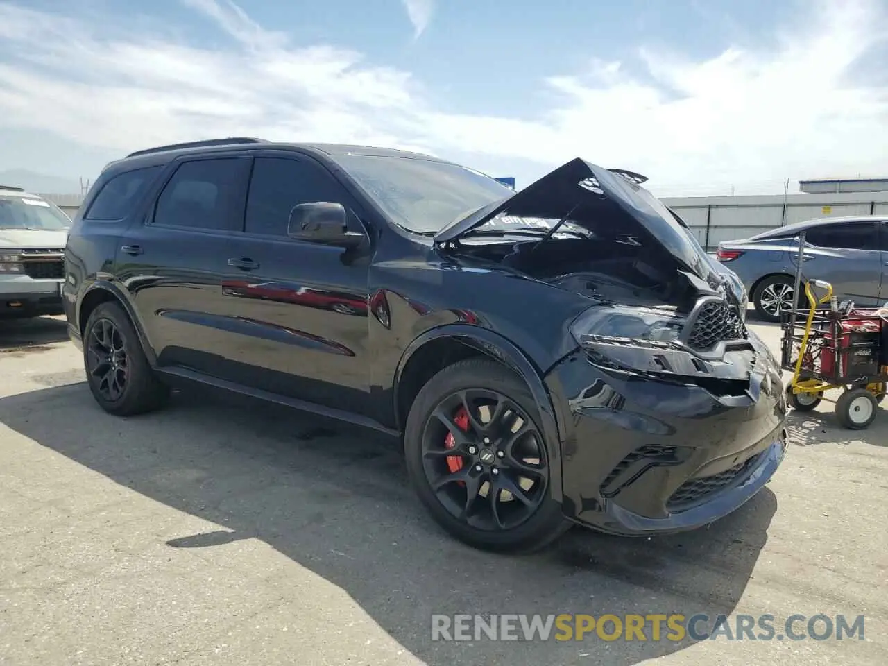 4 Photograph of a damaged car 1C4SDJCT7RC155245 DODGE DURANGO 2024