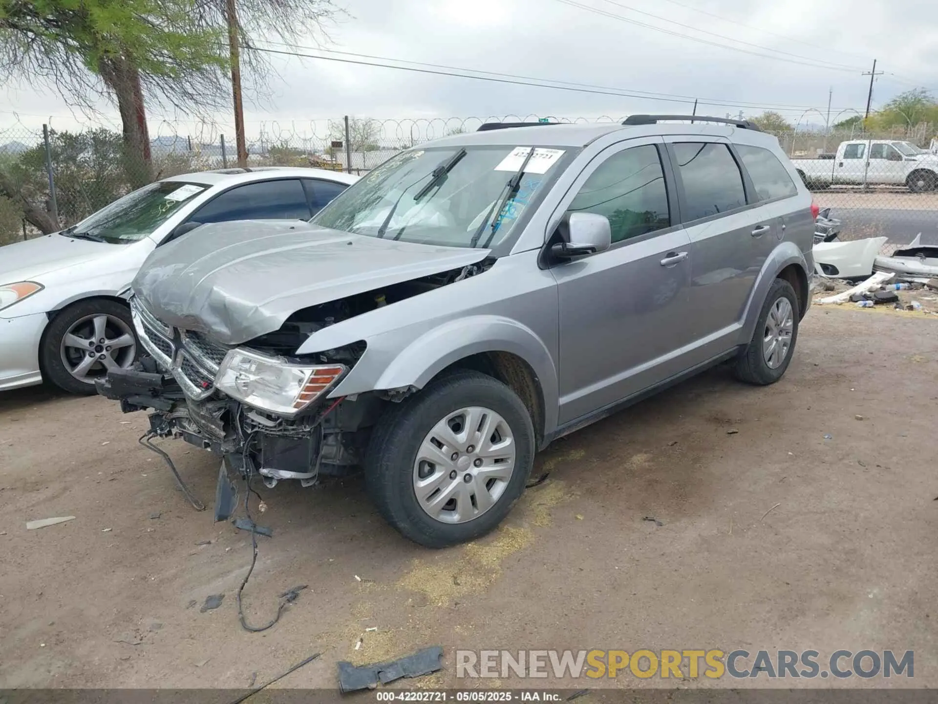 2 Photograph of a damaged car 3C4PDCBB0KT798928 DODGE JOURNEY 2019