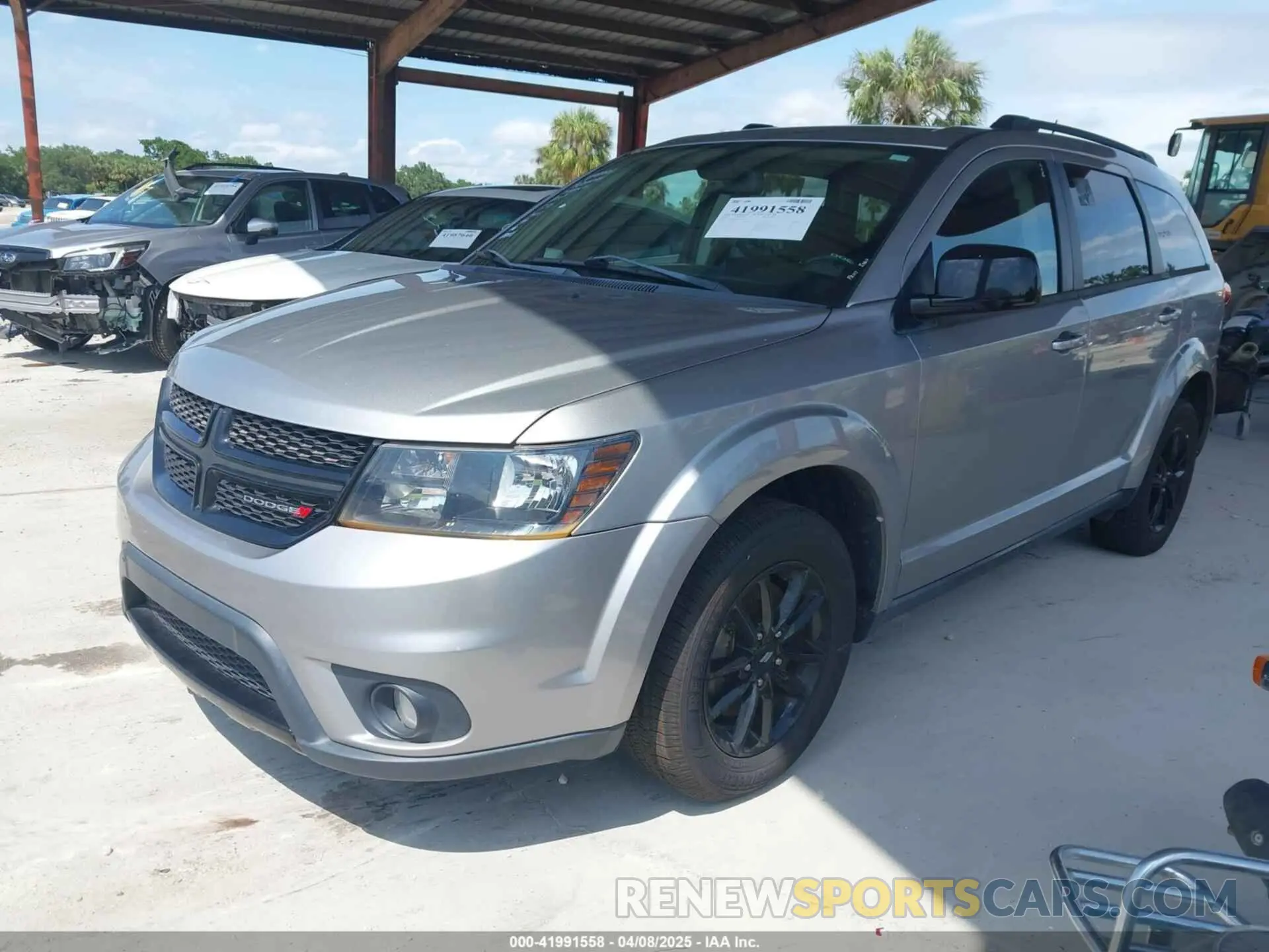2 Photograph of a damaged car 3C4PDCBB0KT848601 DODGE JOURNEY 2019