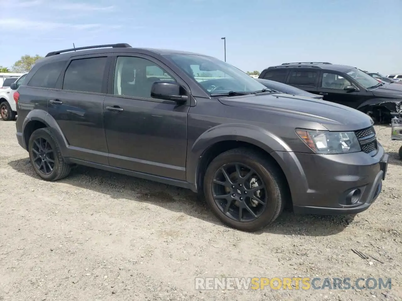4 Photograph of a damaged car 3C4PDCBB4KT701469 DODGE JOURNEY 2019