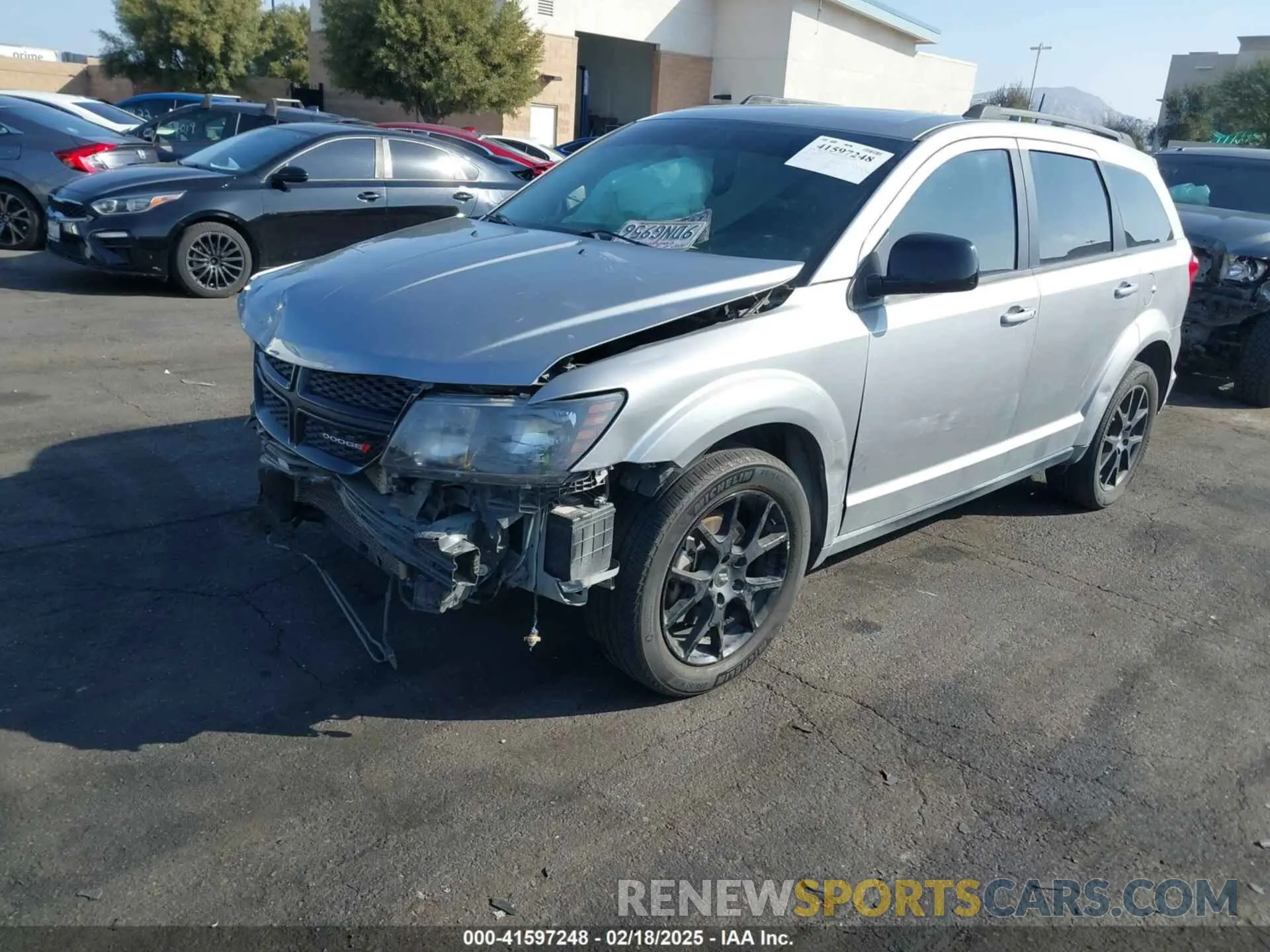 2 Photograph of a damaged car 3C4PDCBB5KT687131 DODGE JOURNEY 2019