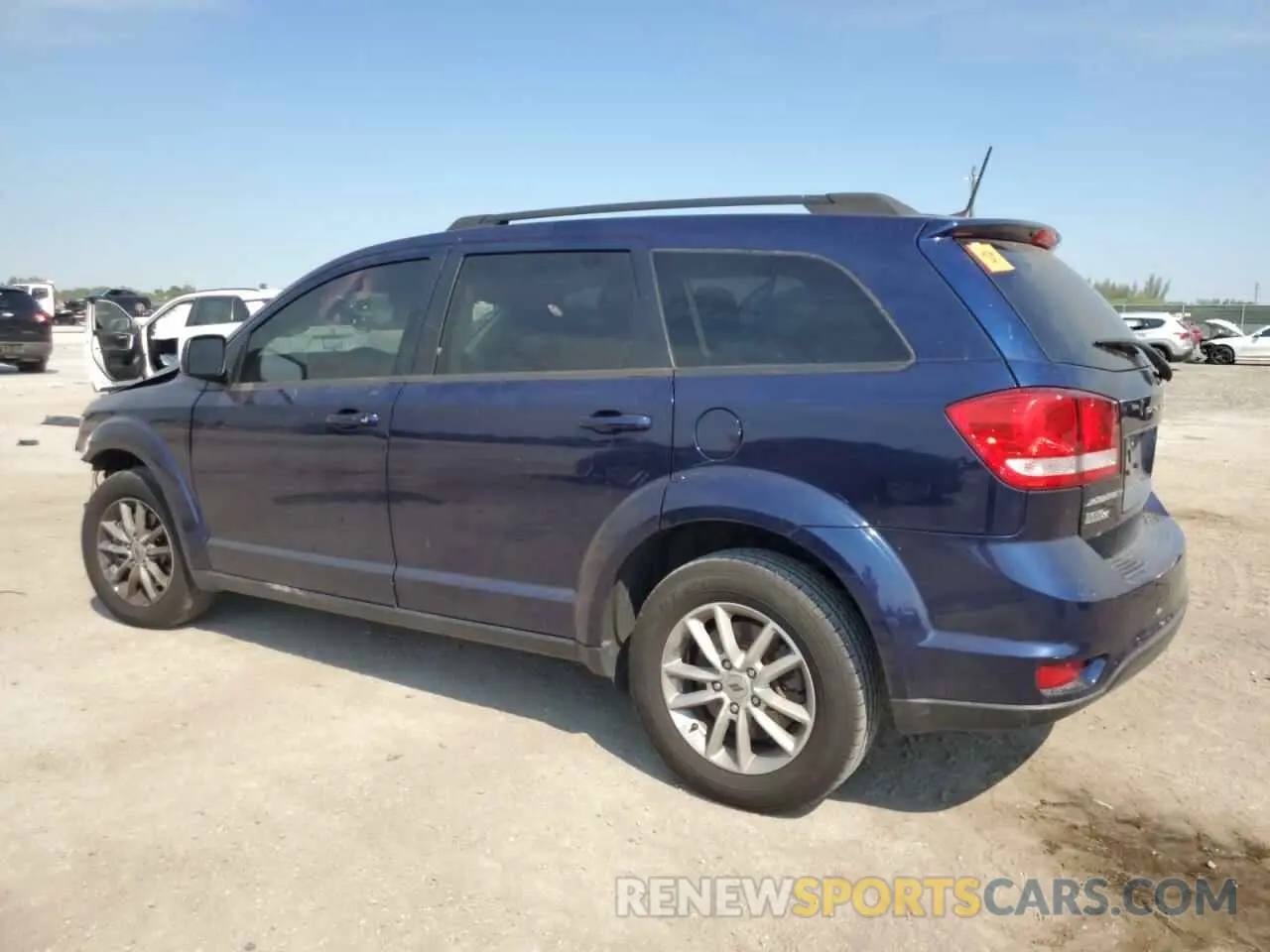 2 Photograph of a damaged car 3C4PDCBB6KT719584 DODGE JOURNEY 2019