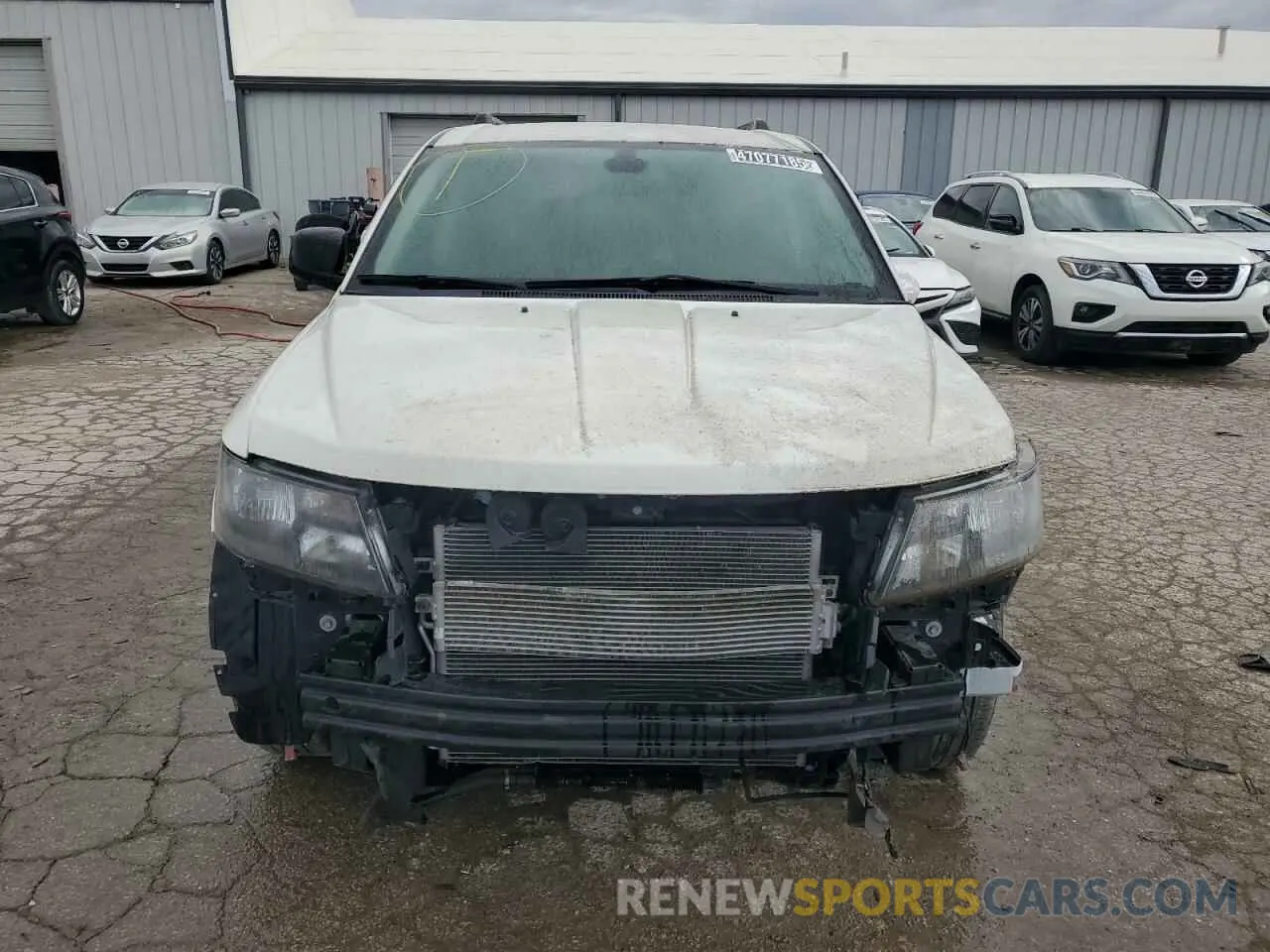 5 Photograph of a damaged car 3C4PDDBG0KT780057 DODGE JOURNEY 2019