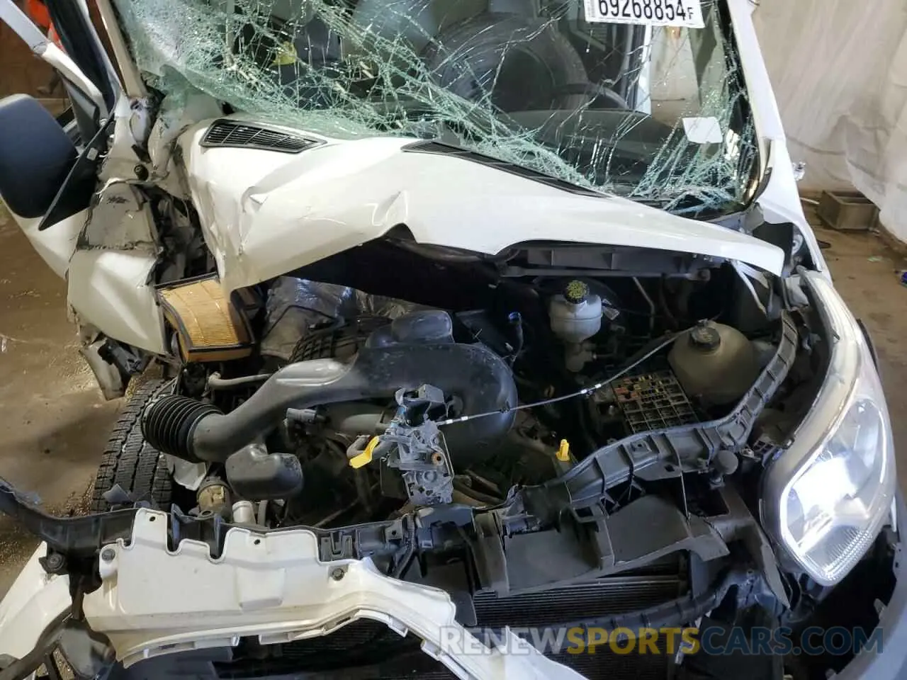 12 Photograph of a damaged car 1FBAX2CM5KKB64074 FORD ALL Models 2019