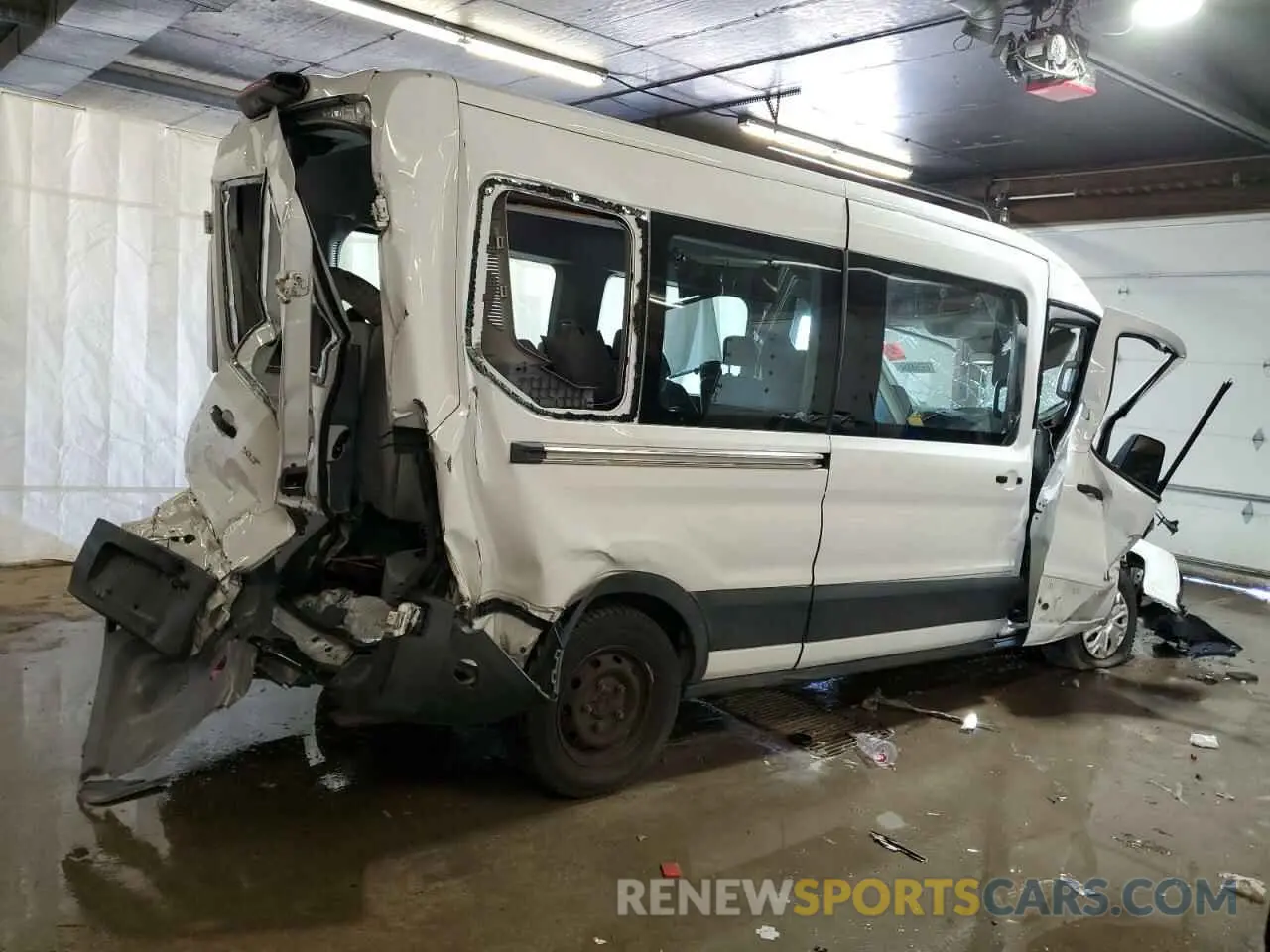 3 Photograph of a damaged car 1FBAX2CM5KKB64074 FORD ALL Models 2019
