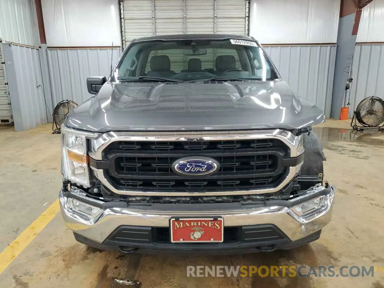 5 Photograph of a damaged car 1FTMF1EP7MKE58611 FORD All Models 2021