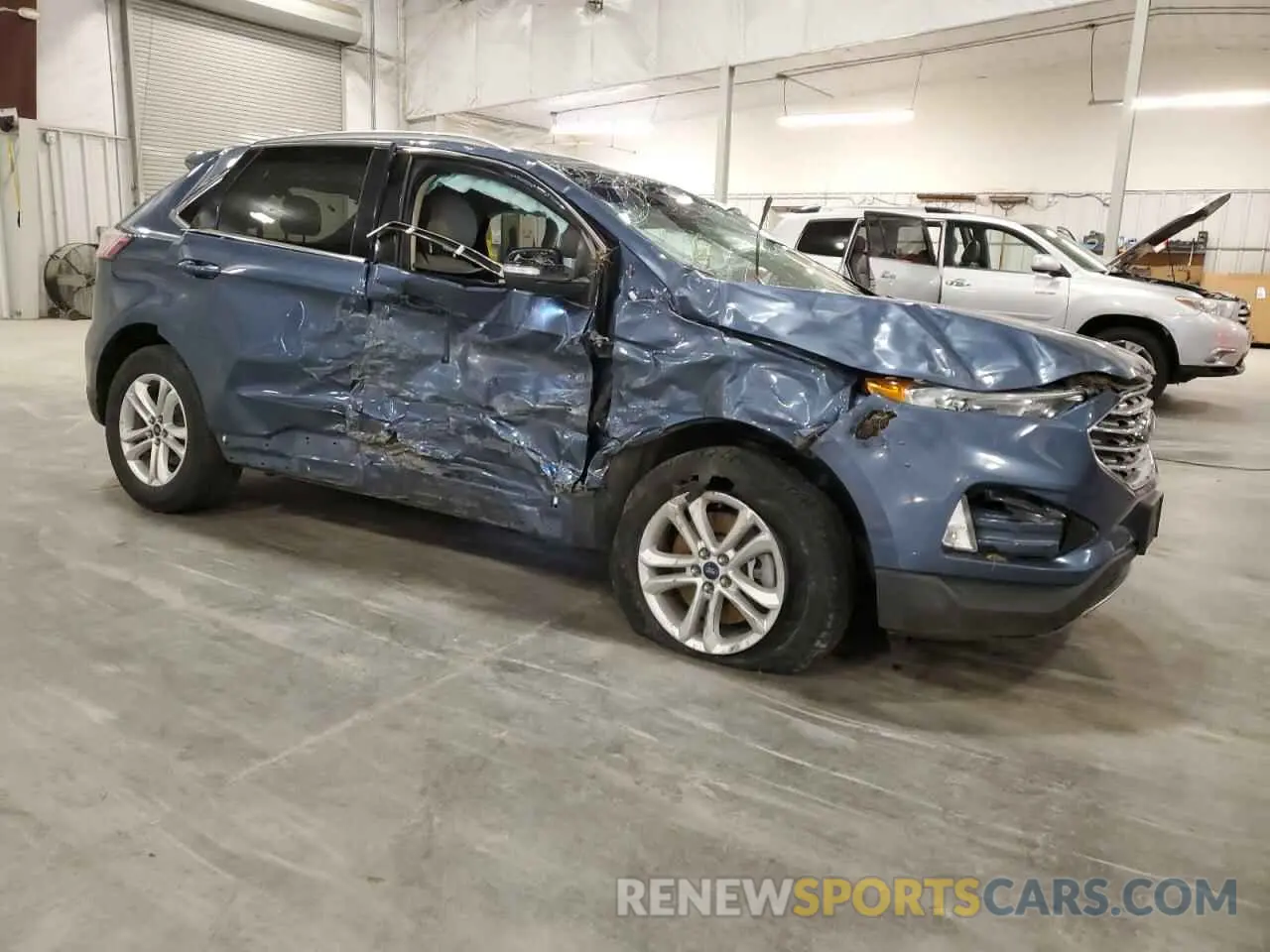 4 Photograph of a damaged car 2FMPK4J92KBC23831 FORD EDGE 2019