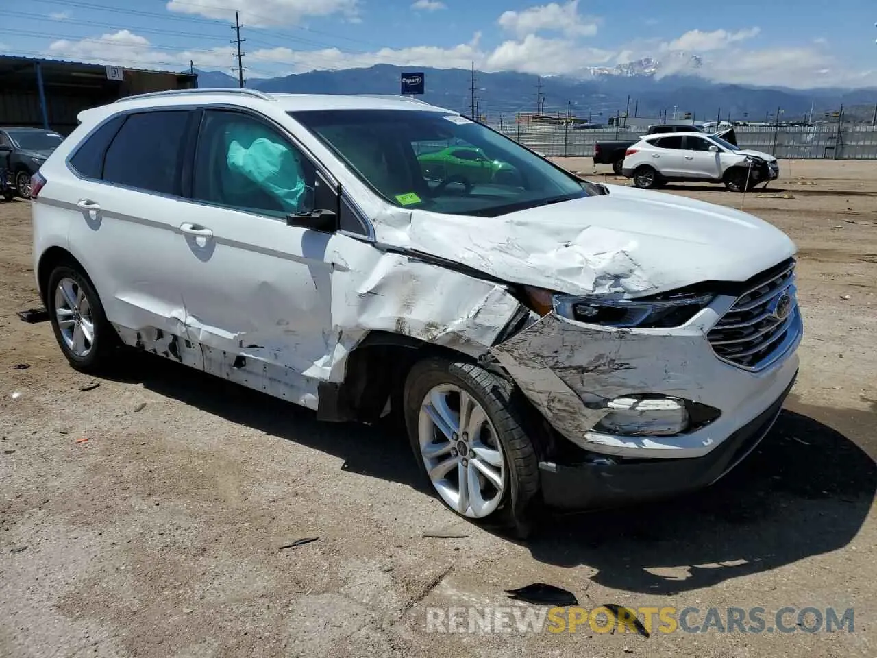 4 Photograph of a damaged car 2FMPK4J9XLBA31297 FORD EDGE 2020