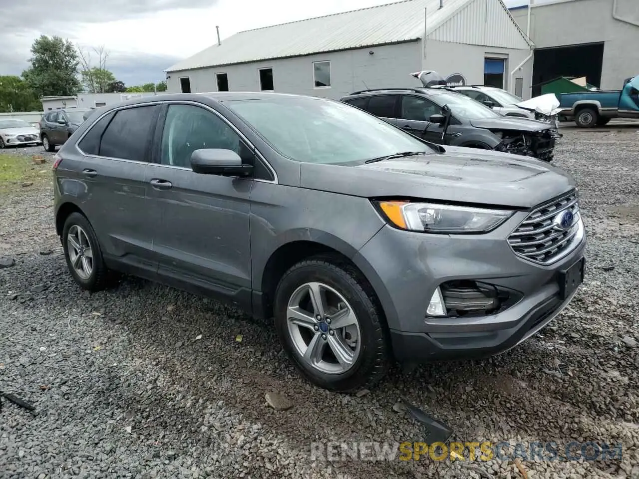 4 Photograph of a damaged car 2FMPK4J94NBA99999 FORD EDGE 2022