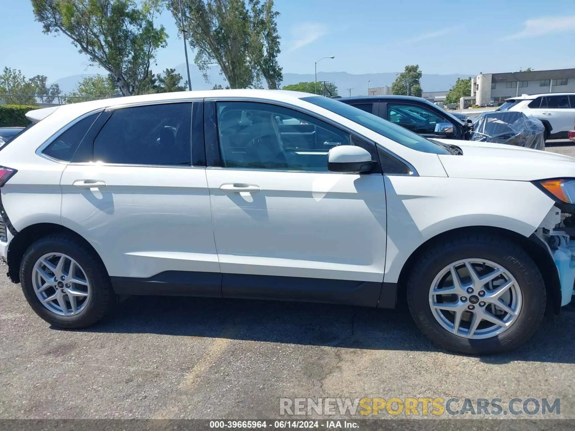 14 Photograph of a damaged car 2FMPK4J93PBA09292 FORD EDGE 2023