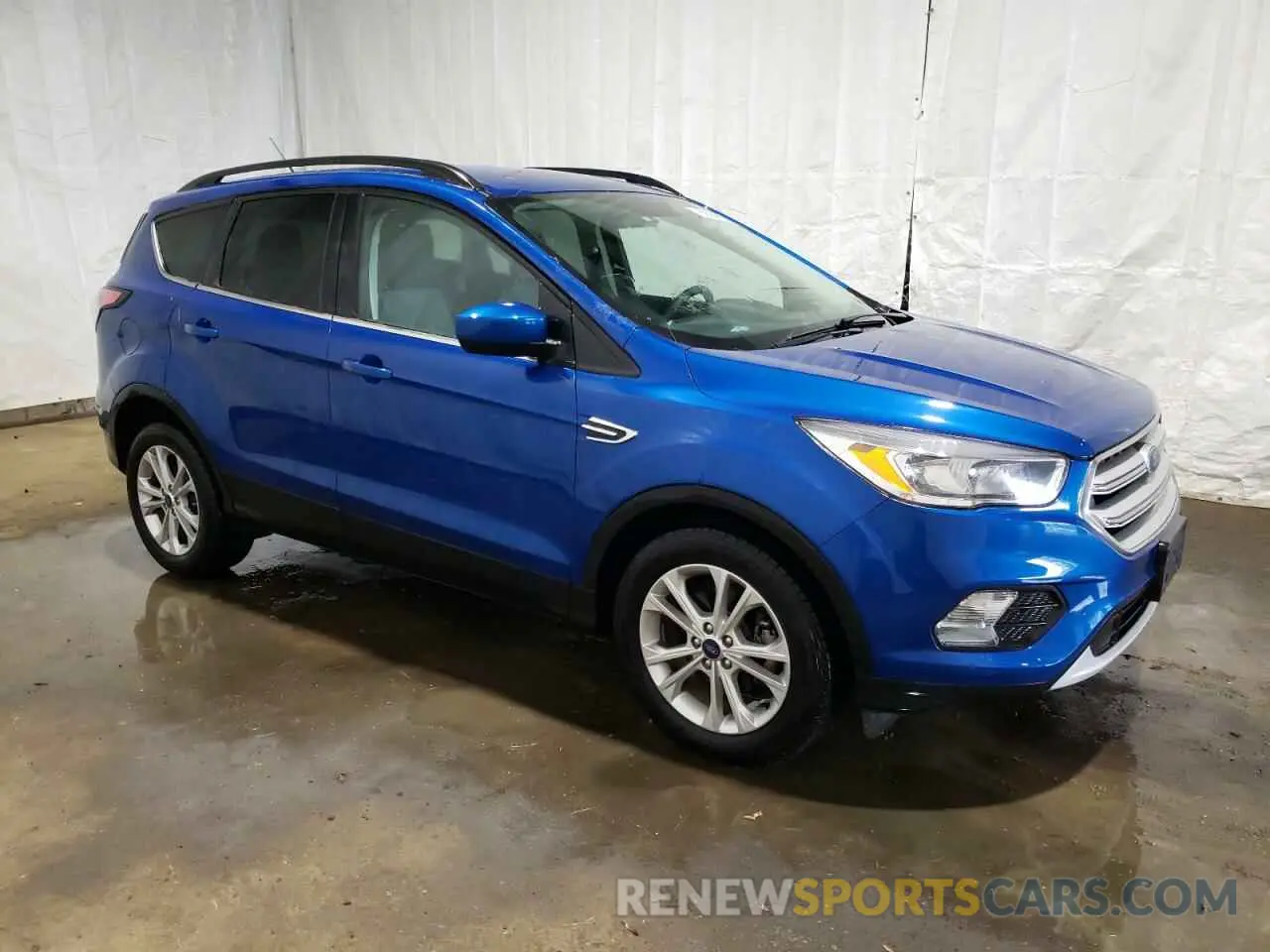 4 Photograph of a damaged car 1FMCU0GD6JUD05986 FORD ESCAPE 2018