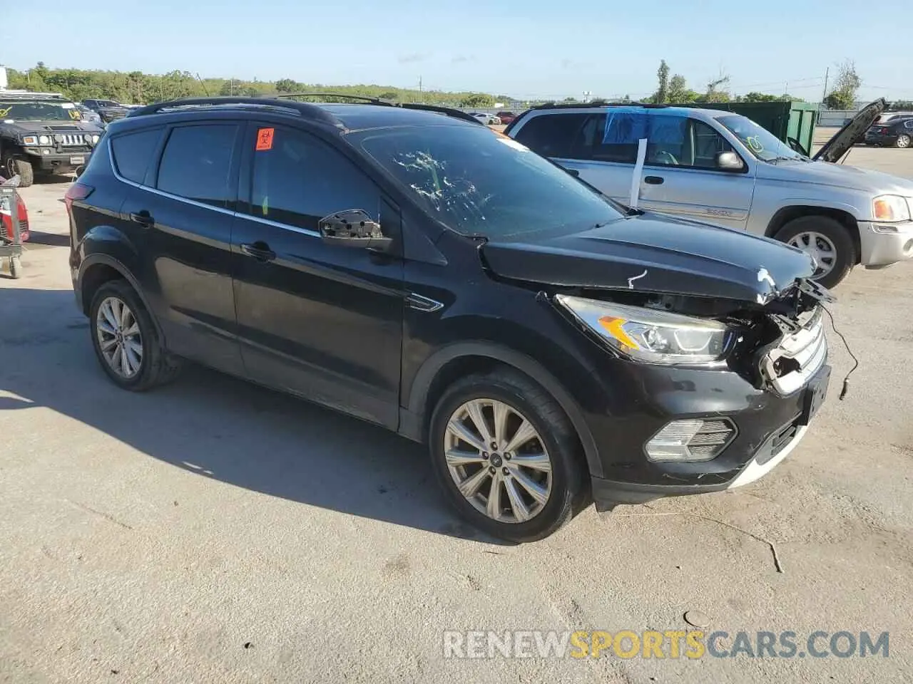 4 Photograph of a damaged car 1FMCU0HDXKUA49934 FORD ESCAPE 2019