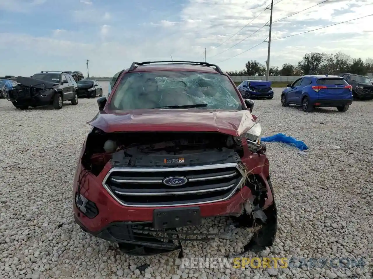 5 Photograph of a damaged car 1FMCU9GD0KUB28860 FORD ESCAPE 2019