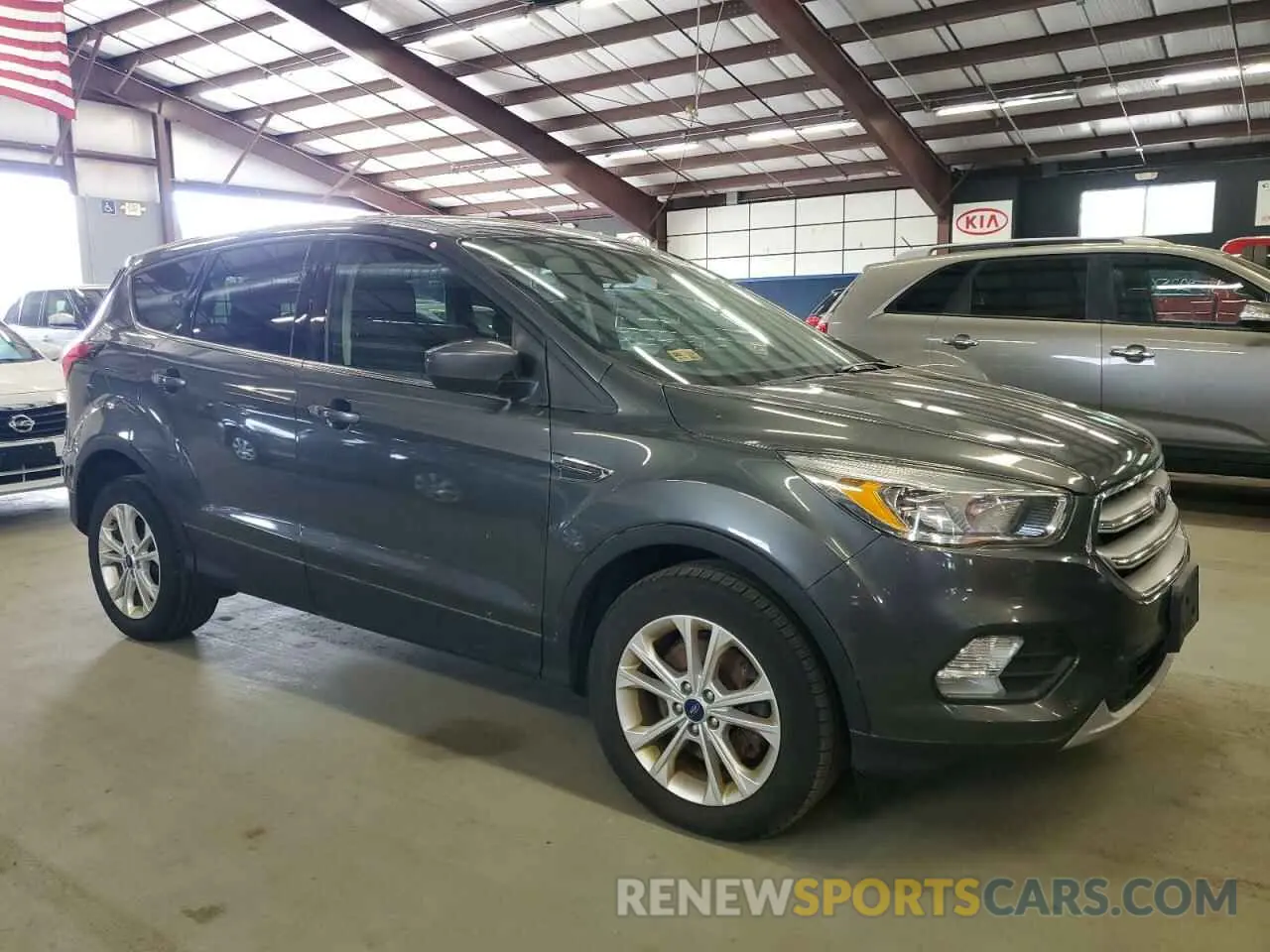 4 Photograph of a damaged car 1FMCU9GDXKUB65575 FORD ESCAPE 2019