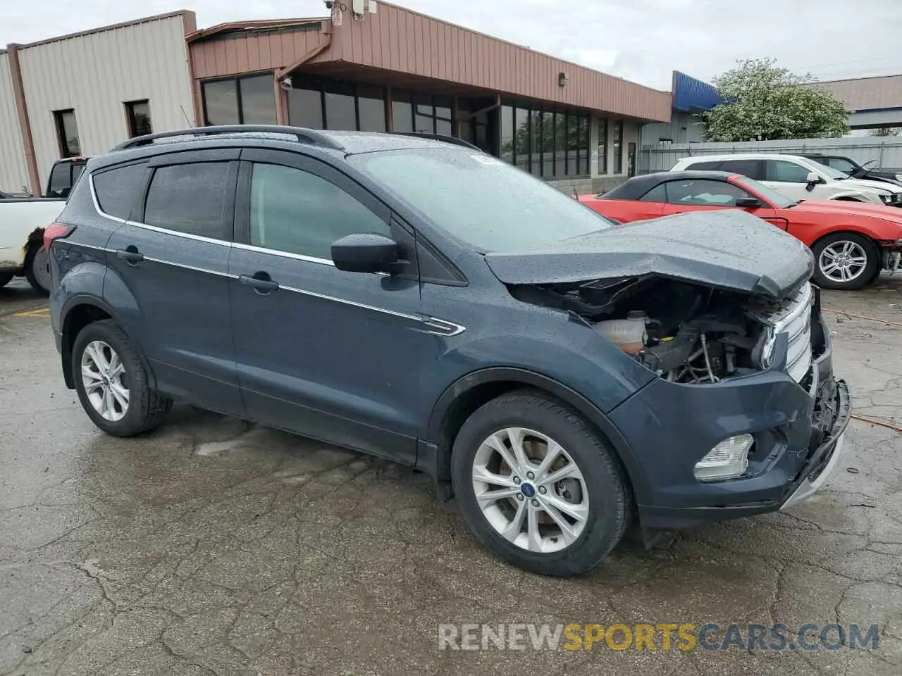 4 Photograph of a damaged car 1FMCU9H92KUB73230 FORD ESCAPE 2019