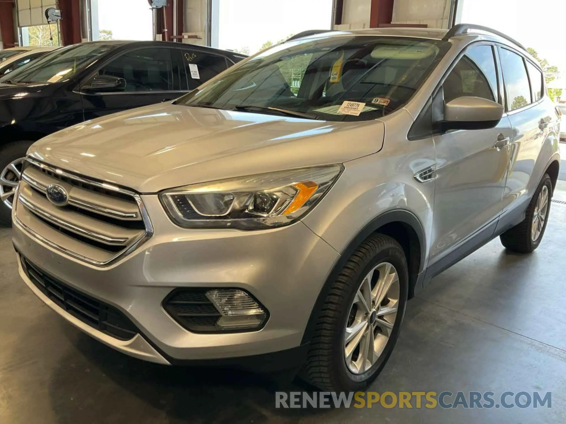 23 Photograph of a damaged car 1FMCU9HD8KUB82387 FORD ESCAPE 2019
