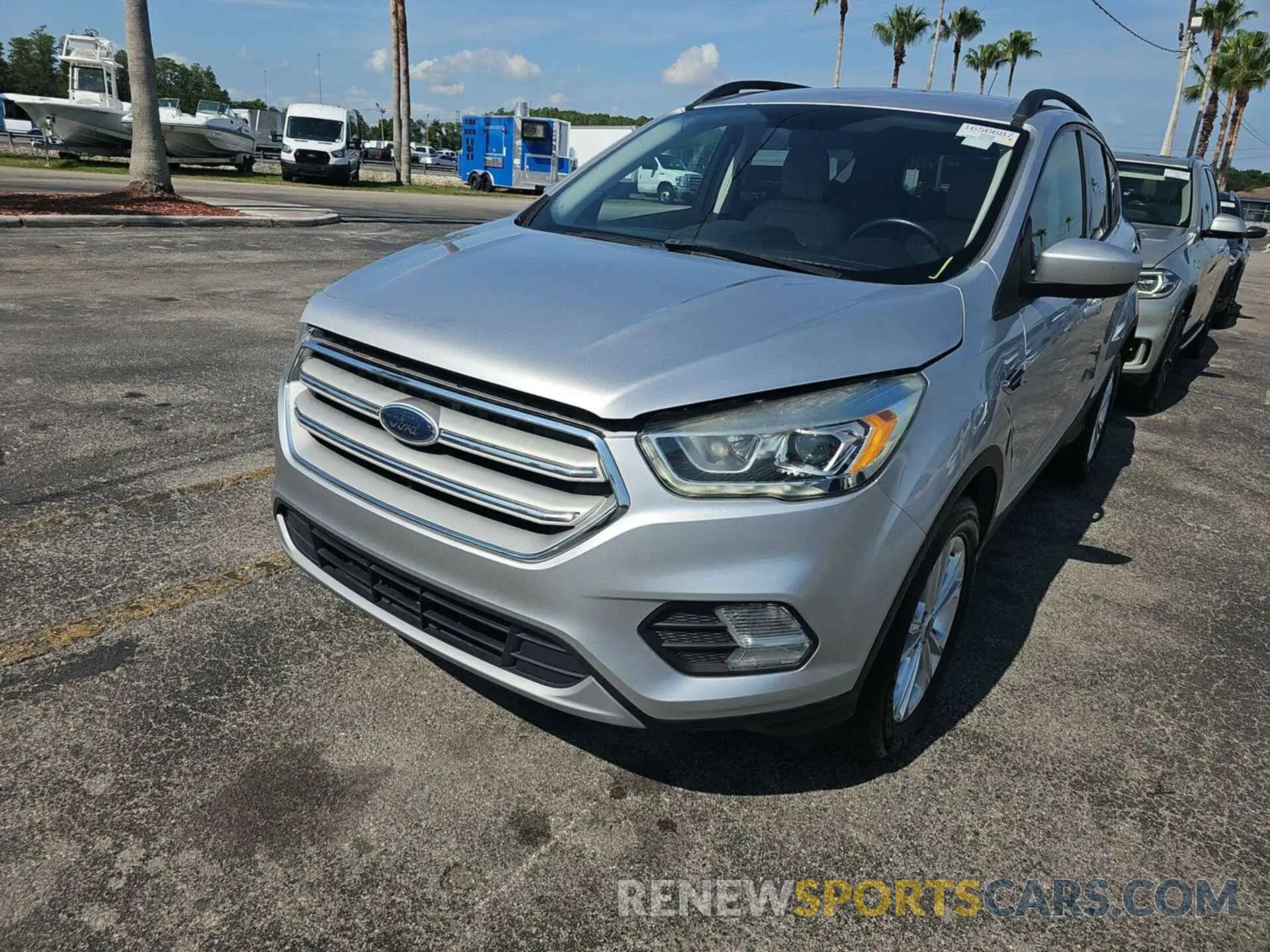 19 Photograph of a damaged car 1FMCU9HD9KUA65577 FORD ESCAPE 2019
