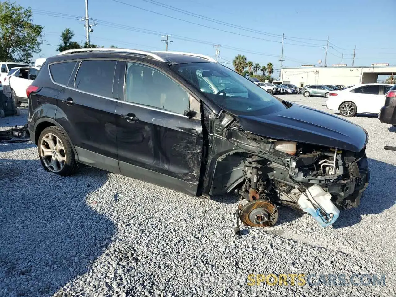 4 Photograph of a damaged car 1FMCU9J90KUA75324 FORD ESCAPE 2019