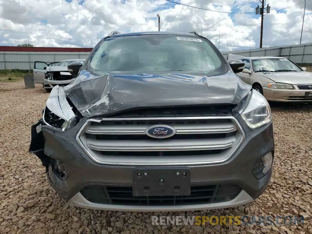 5 Photograph of a damaged car 1FMCU9J95KUC03931 FORD ESCAPE 2019