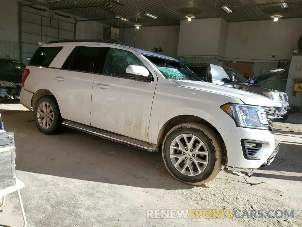 4 Photograph of a damaged car 1FMJU1JT1MEA04571 FORD EXPEDITION 2021